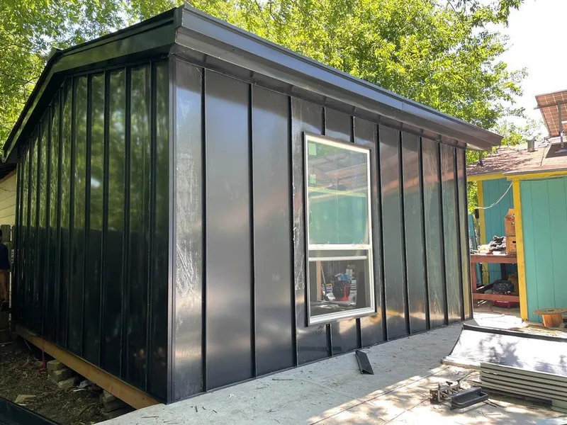 Black standing seam metal wall panels for Metal Roof Installation in South Middleton