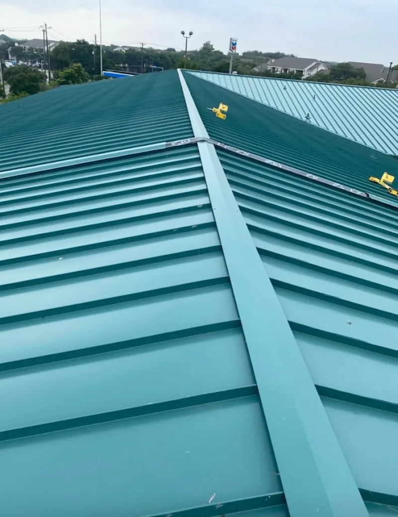 Green commercial metal roof ridge and valley for Metal Roof Repair in South Middleton