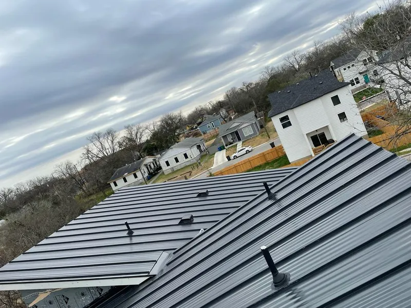 Standing seam metal roof panels with vents for Skylight Repair in South Middleton